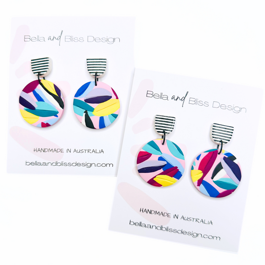 Emma // Rainbow Leaves // Clay Dangle Earrings // Yellow, Blues, Green, White, Black, Fuchsia and Stripes