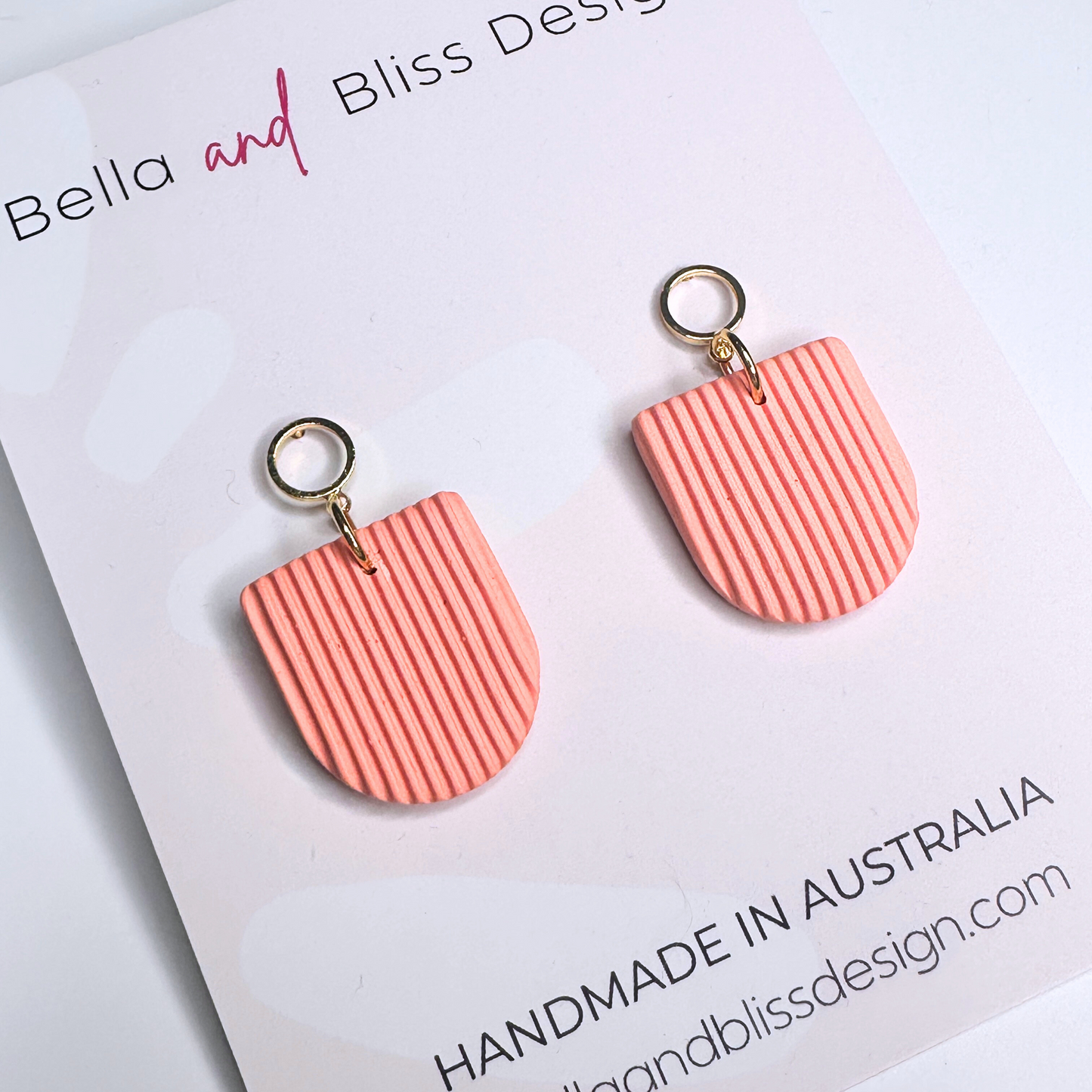 Charlotte // Clay Dangle Earrings // Embossed Stripes Coral