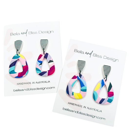 Freya // Rainbow Leaves // Clay Dangle Earrings // Yellow, Blues, Green, White, Black, Fuchsia  and Stripes